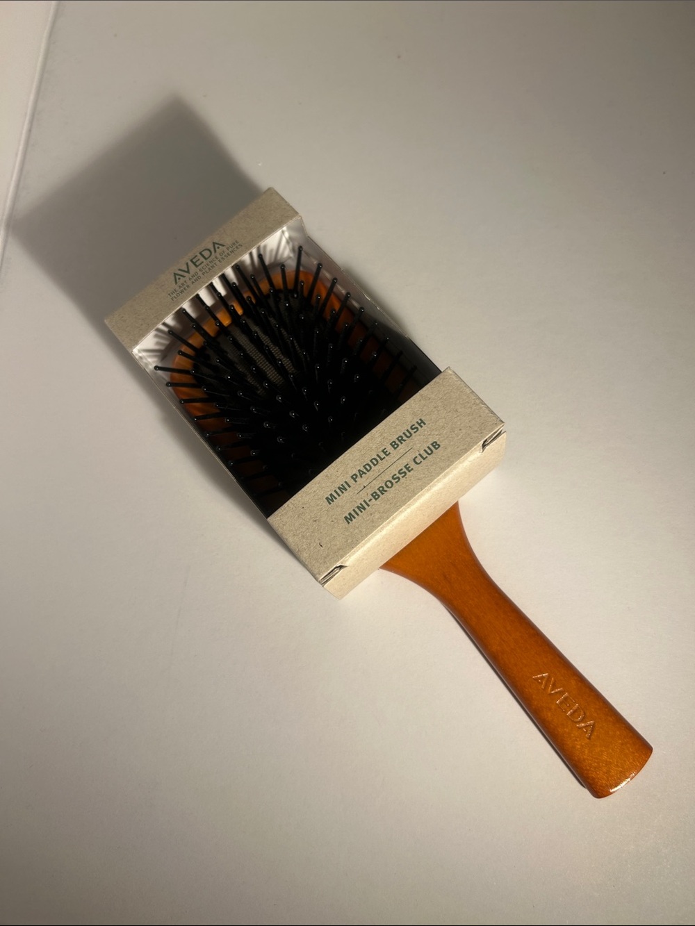 AVEDA Mini Paddle Brush — Brown Handle with Black Bristles